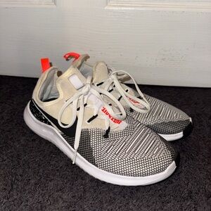 Nike Black and White Sneakers with orange Accents